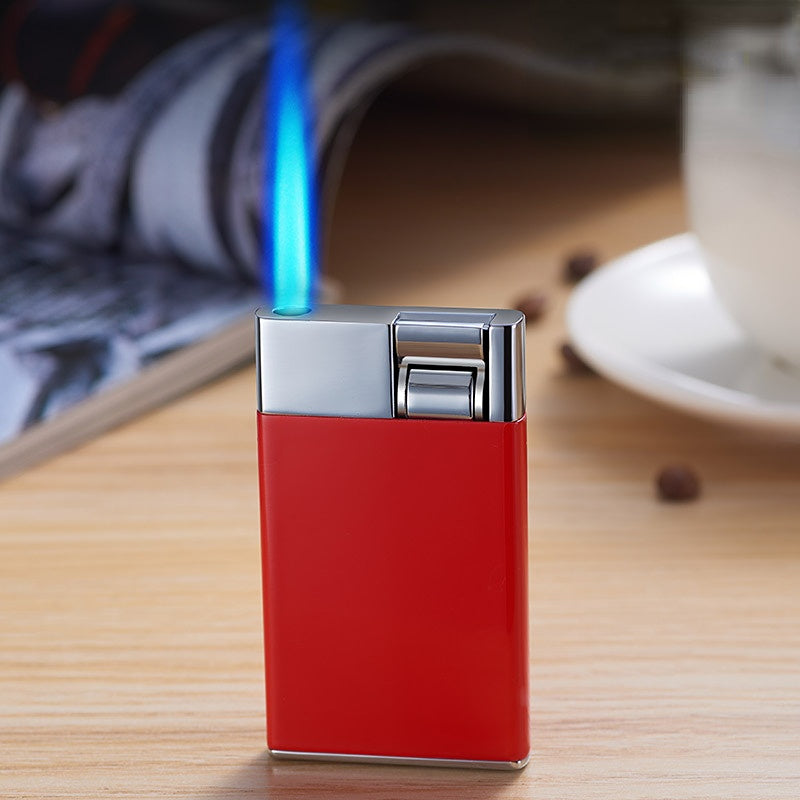 Lever press lighter